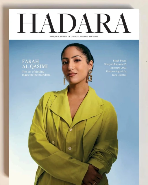 Magazine cover featuring Farah Al Qasimi in a chartreuse suit against a sky-blue background, with 'HADARA' in bold at the top.