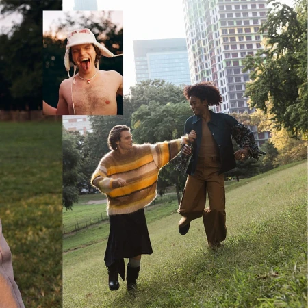 Two men running and laughing on a grassy hill outdoors, with a separate inset photo showing a shirtless man wearing a white bucket hat.