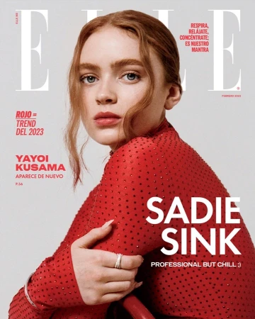 Magazine cover featuring Sadie Sink, in a red embellished top, with the Elle logo, against a light gray background, showcasing a close-up shot.
