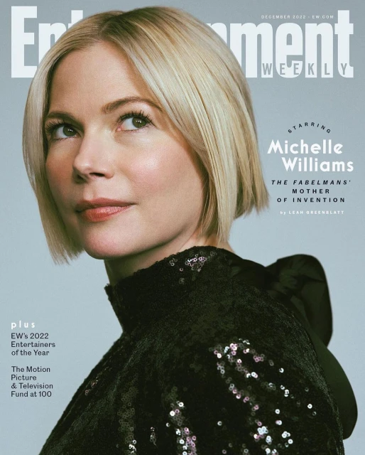 Close-up of Michelle Williams on a magazine cover with blonde bob, black sequined dress, Entertainment Weekly, December 2022 issue.