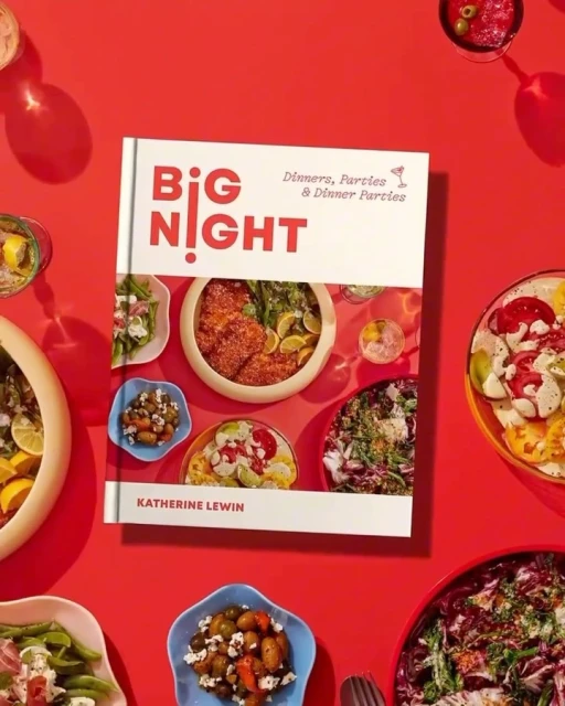 Cookbook titled 'Big Night: Dinners, Parties & Dinner Parties' by Katherine Lewin surrounded by various dishes on a red background.