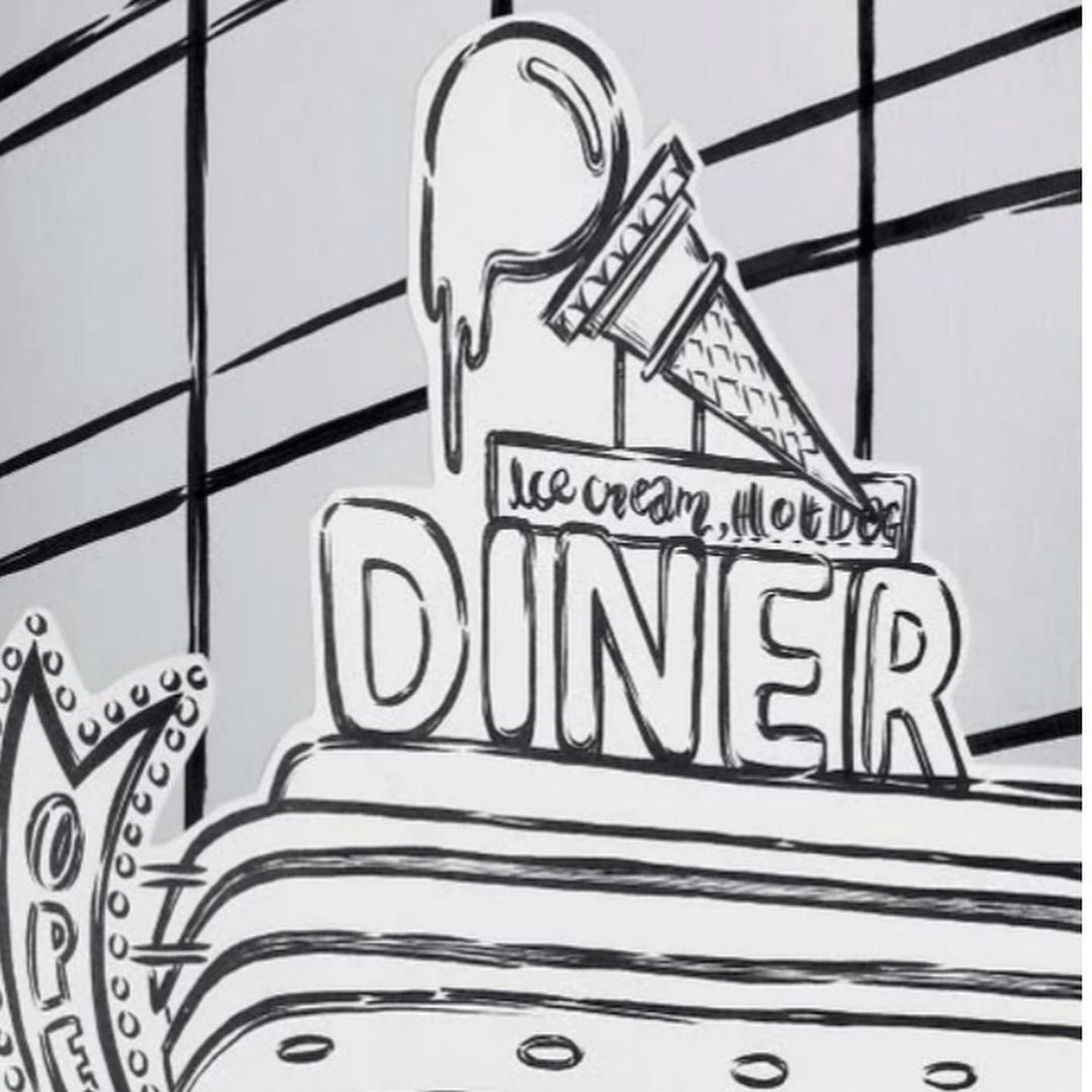 Black and white illustration of a vintage diner sign, featuring an ice cream cone, the word 'Diner,' and neon-style decorative elements.