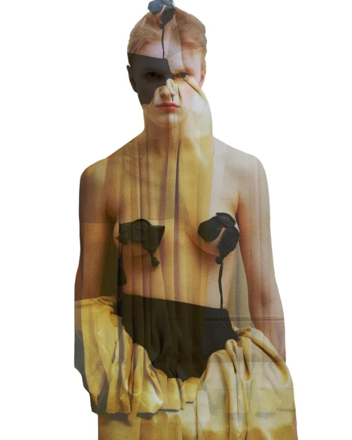 A person with pale skin and auburn hair is posed in front of an off-white background with a black geometric design over their face.