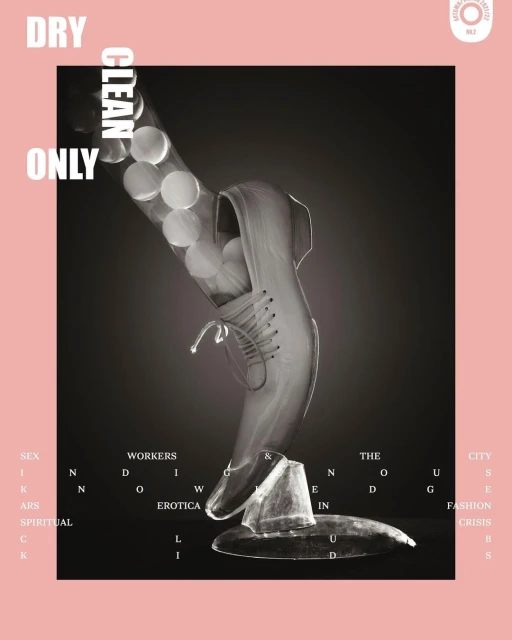 Monochrome art: A sneaker appears to step onto a clear hat form, set against a black backdrop with overlaid white text and a pink border.