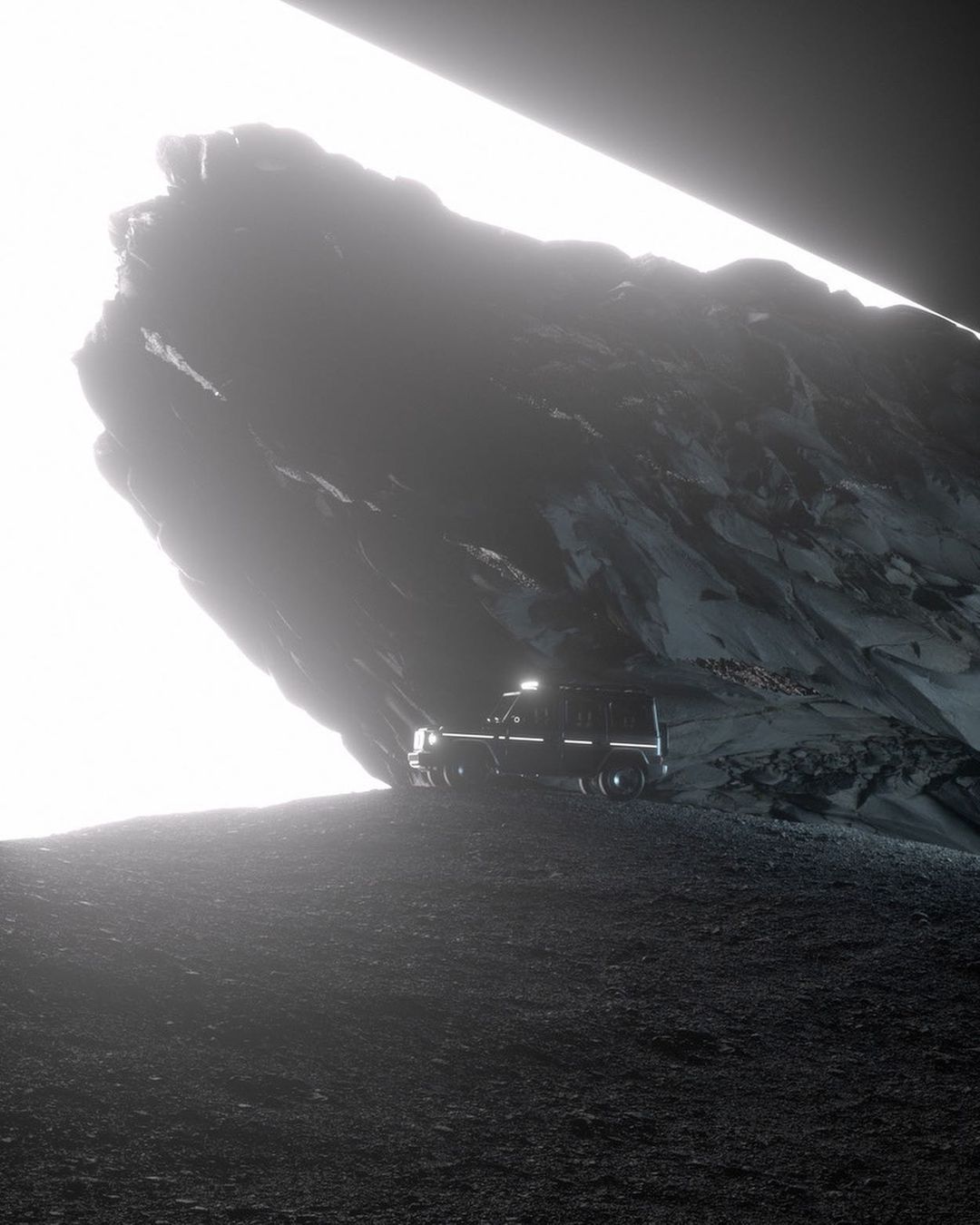 SUV parked inside a dark cave with a rugged rock formation under bright sunlight, emphasizing adventure and automotive capabilities.