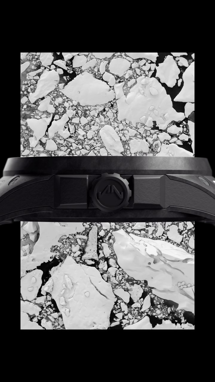 Close-up of a black wristwatch featuring an abstract representation of icebergs, set against a solid black background, showcasing a modern design.