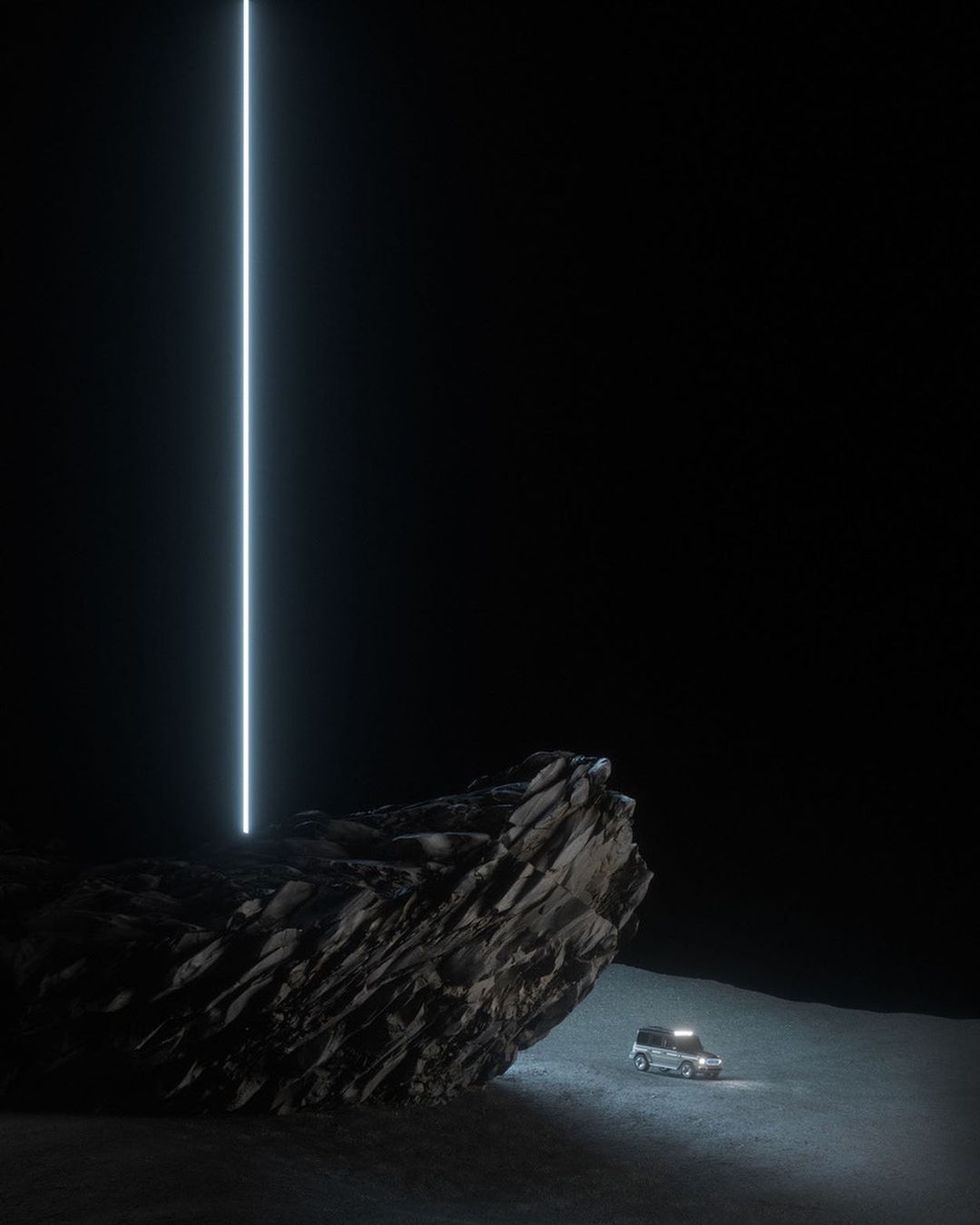 SUV parked on a dark, rocky, desert-like surface with a tall, thin, blue light emanating from a large rock, creating a surreal, moody atmosphere.