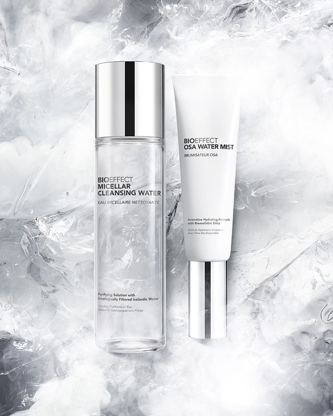 Bioeffect skincare product bottles: Micellar Cleansing Water and OSA Water Mist, in a minimalistic studio setting with ice-like background texture.