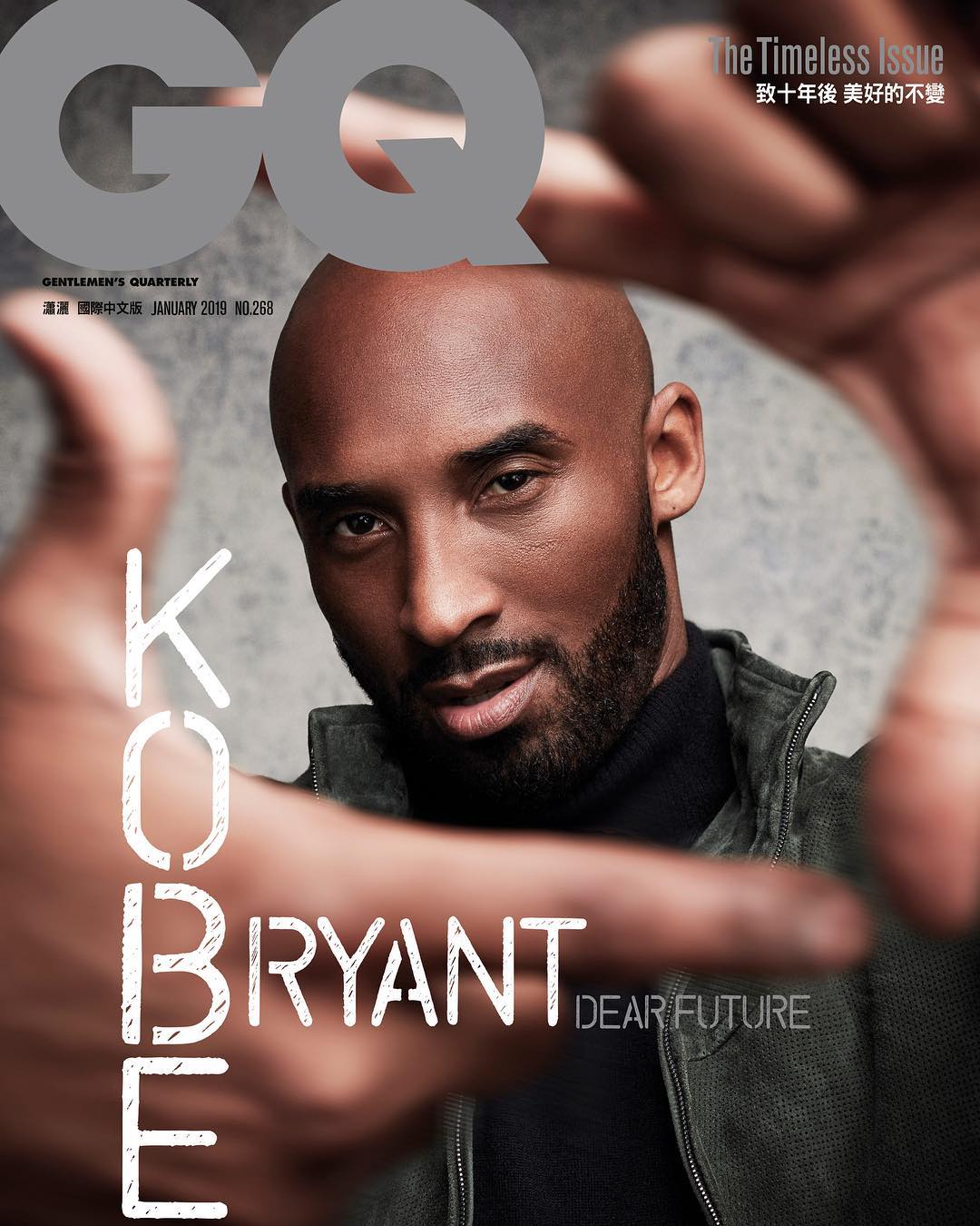 GQ magazine cover featuring a close-up of Kobe Bryant, an African-American adult male, framed by hands in the foreground.