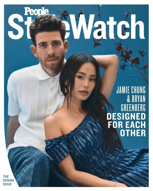 Magazine cover features Jamie Chung and Bryan Greenberg in a medium shot with blue background and white text. Jamie wears a blue off-shoulder dress.