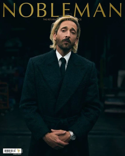 Magazine cover featuring Adrien Brody wearing a dark overcoat and tie. The masthead reads 'NOBLEMAN'.