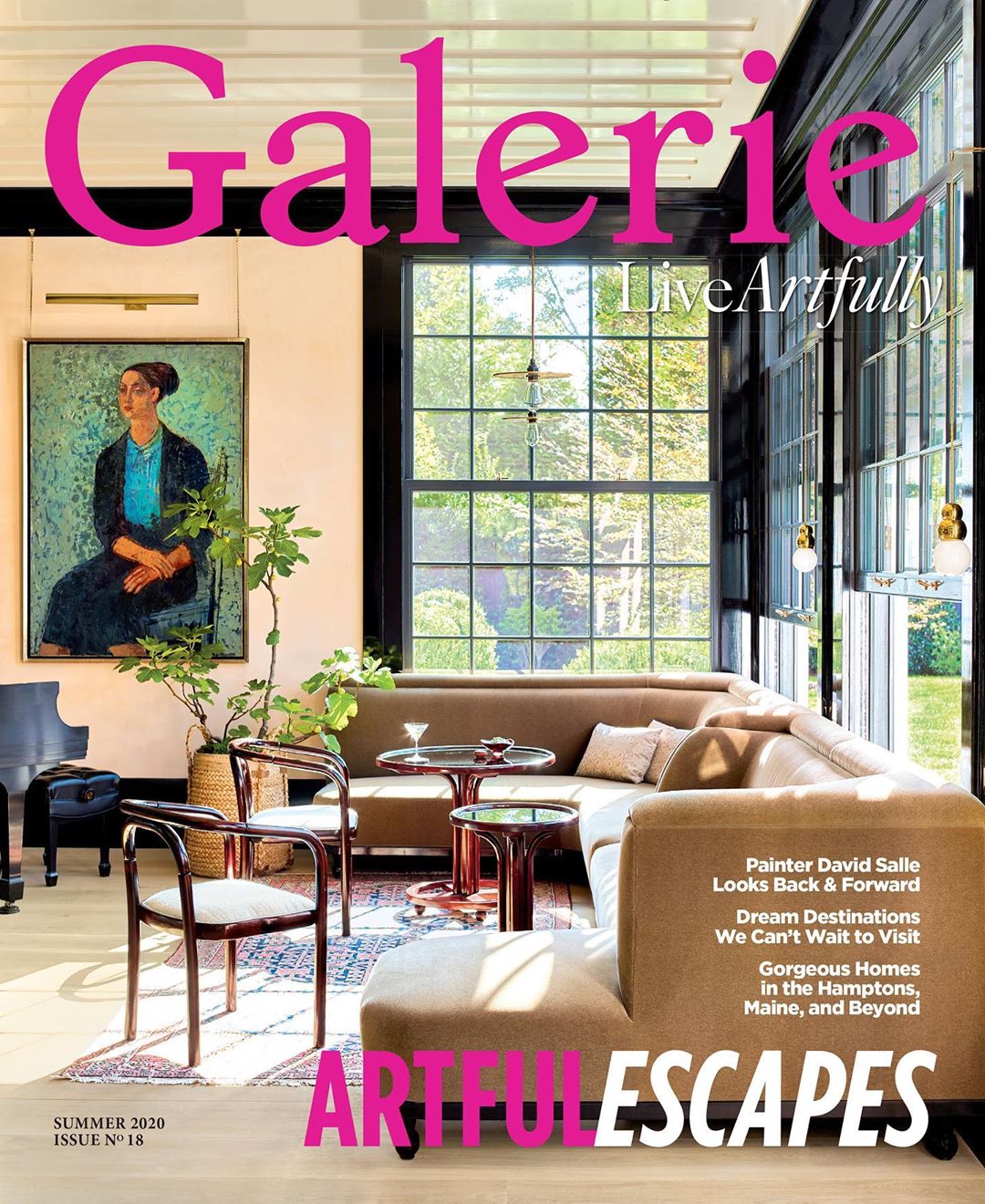 Magazine cover featuring a modern living room interior with a large window, artwork, and contemporary furniture in neutral tones.