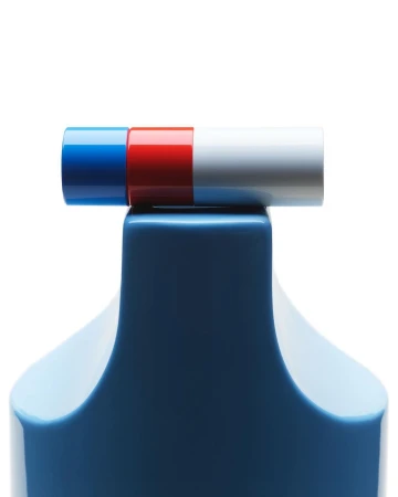 Close-up of a blue bottle base topped by a horizontal cylinder divided into blue, red, and white sections against a white backdrop.