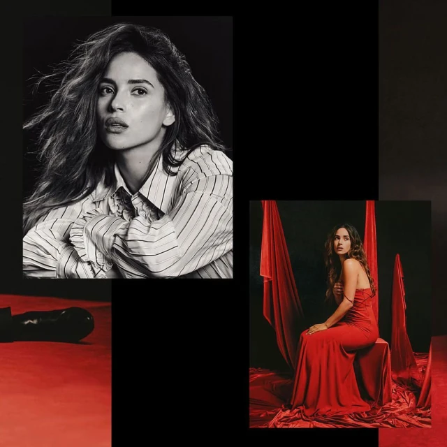 Black and white and color portrait of woman in striped shirt and red gown against red and black background in studio setting.