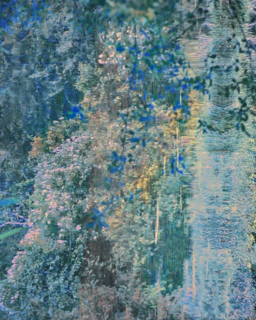 Artistic water reflection of a lush green forest with trees and foliage in cool blue tones, abstracting nature into a vibrant dreamy scene.