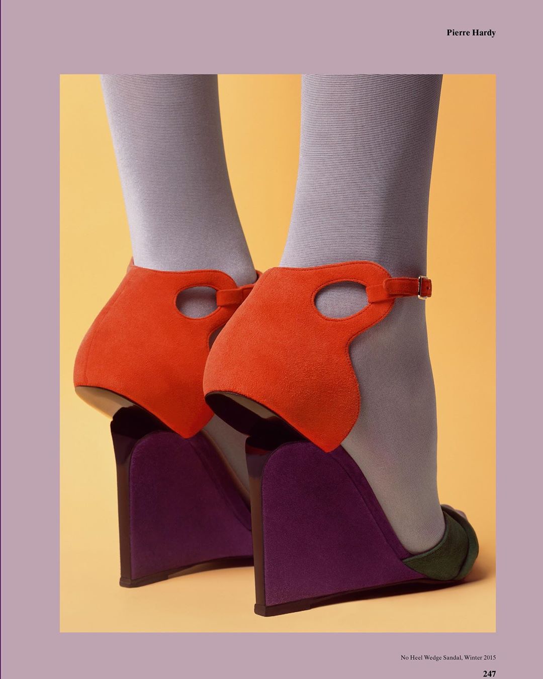 Wedge sandals by Pierre Hardy featuring an orange suede upper, purple wedge heel, and grey hosiery against a yellow background.