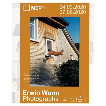 Exhibition poster featuring Erwin Wurm photography with a person's legs extending from a shingled house window.