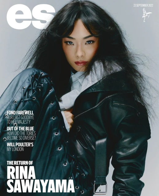 Magazine cover featuring Rina Sawayama in a leather jacket against a neutral background. Her hair is long and dark, and the text reads 'Rina Sawayama'.