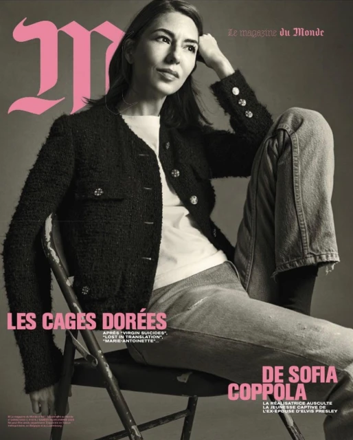 Magazine cover featuring Sofia Coppola in a chair. She is wearing a black tweed jacket and blue jeans. The background is grey.