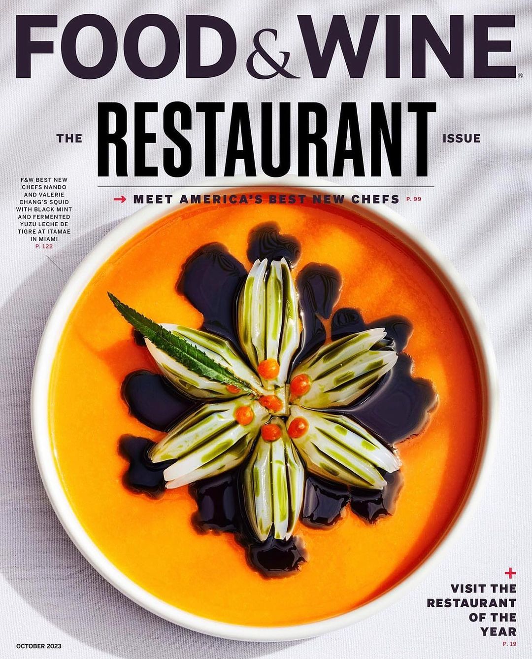 Food & Wine magazine cover featuring a vibrant orange soup with a flower-shaped garnish made of vegetables and dark sauce.