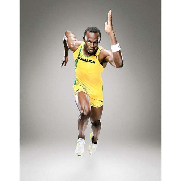 Action shot of Usain Bolt, an adult male athlete, running in a yellow and green uniform against a gray gradient background.