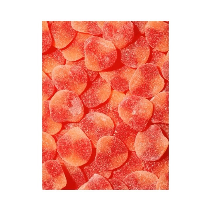 Pile of vibrant red gummy candies with a sugar coating, evenly distributed filling the entire frame, shot in a studio setting.