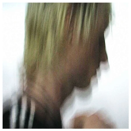 Close-up profile of a blonde person in a dark top with white stripes, captured with heavy horizontal scan lines.