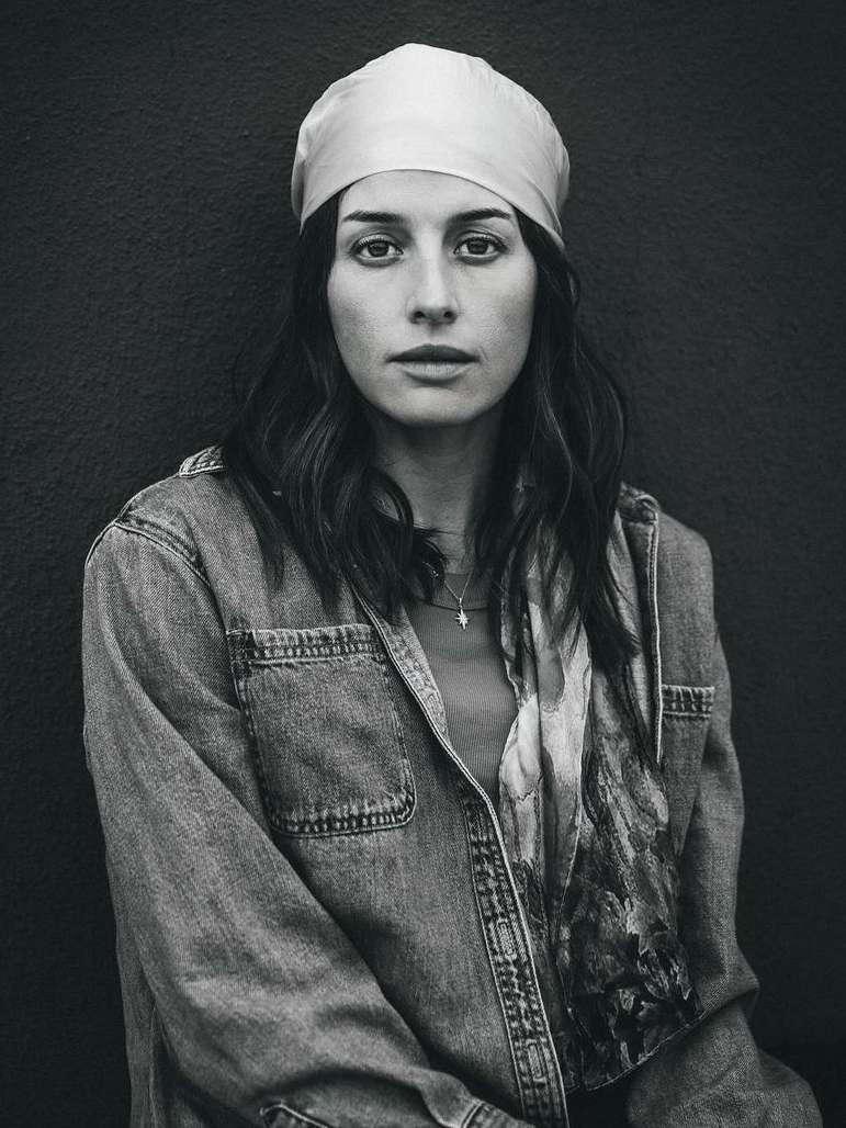 Portrait of a woman wearing a headscarf and denim jacket photographed by Fab Fernandez in New York