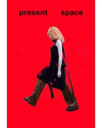 Model with blonde hair wearing a black sleeveless dress and leopard print trousers walking against a red background