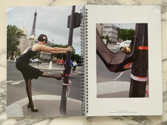 Editorial magazine spread featuring a woman posing on a Paris street next to the Eiffel Tower and a close-up shoe detail