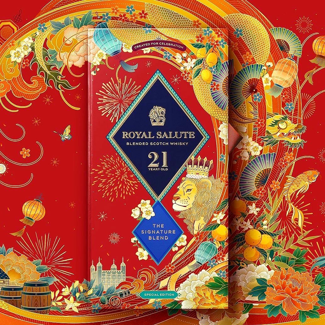 Royal Salute Blended Scotch Whisky 21 Years Old special edition with floral and dragon decoration, set against a red background.