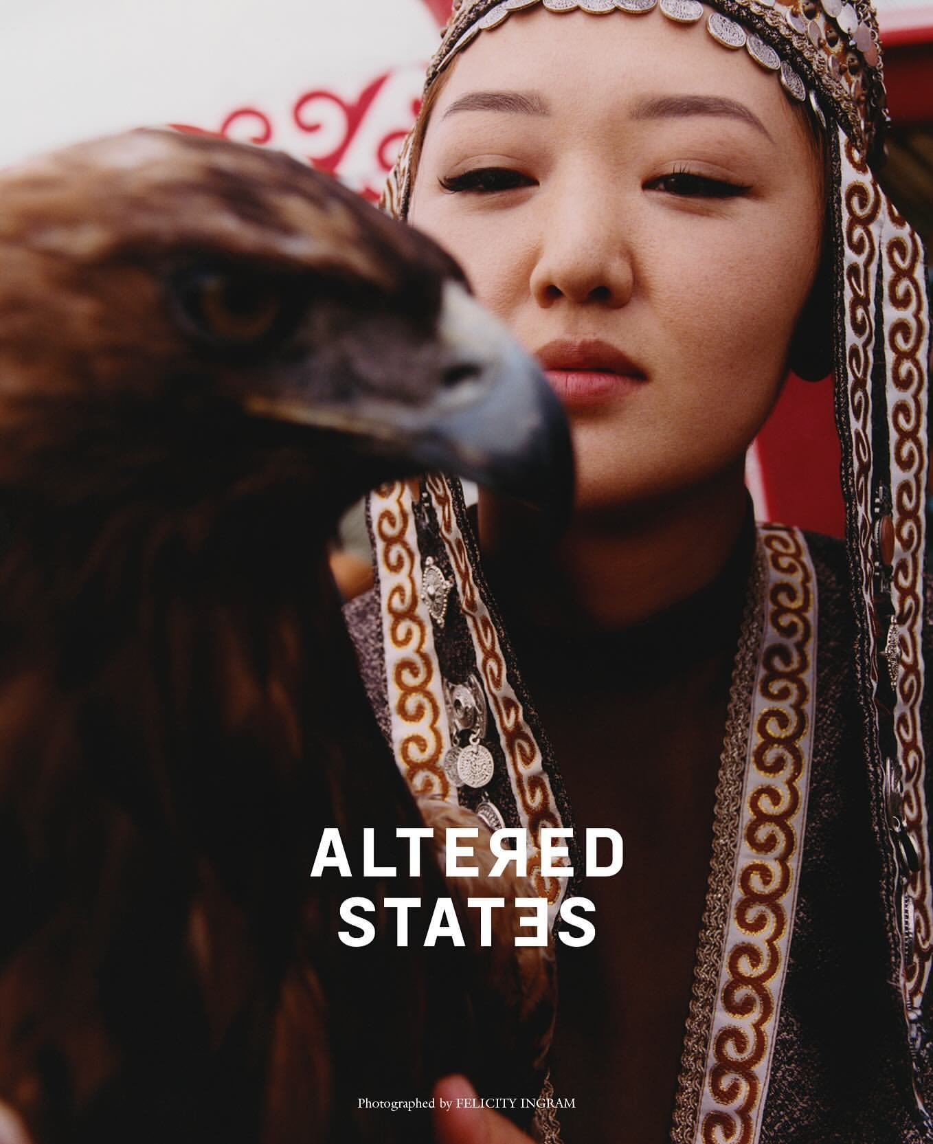Portrait of an asian woman in traditional clothing with an eagle, close-up shot with shallow depth of field, outdoor setting. Fashion editorial.