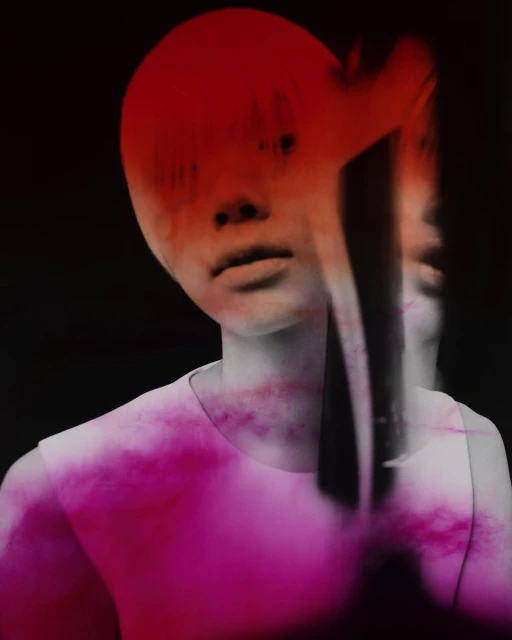 Creative studio portrait featuring a person with short red hair, a semi-transparent column, and pink smoke effects against a dark background.