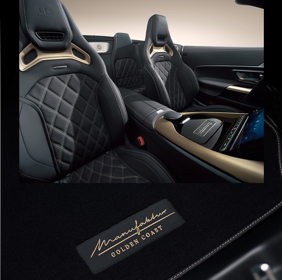 Luxury car interior featuring black leather seats with diamond stitching and golden trim, showcasing high-end automotive design.