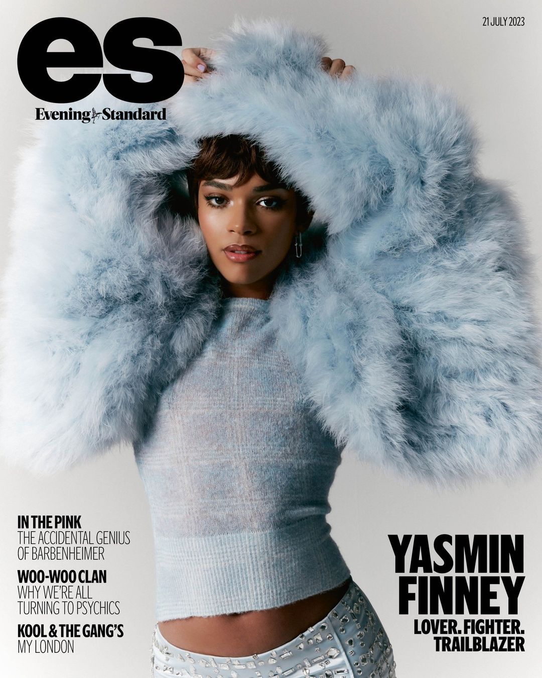 Yasmin Finney poses on a magazine cover wearing a fuzzy light-blue top. The magazine cover also features the logo of Evening Standard.