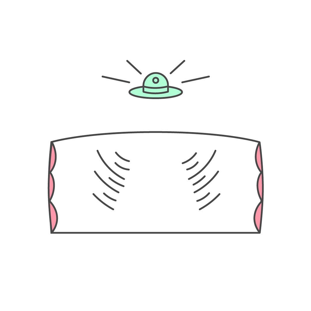 Illustration of a white pillow with pink accents underneath a green UFO with lights, all against a white background.