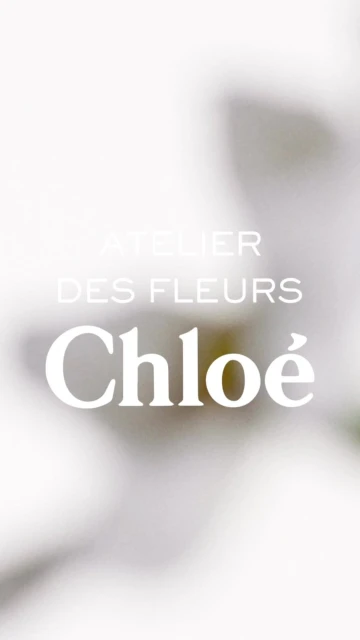 Abstract floral display for Chloé's Atelier des Fleurs, featuring blurred white flowers and minimalist text overlay.