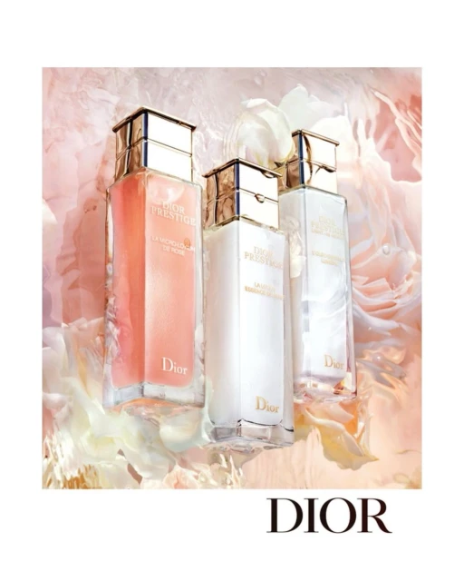 Dior Prestige skincare product line featuring three bottles against a soft floral background, showcasing luxury beauty and brand aesthetic.