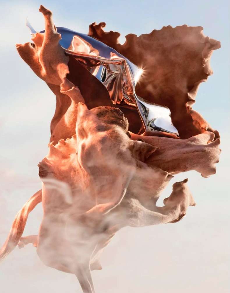 Abstract rendering of a fluid metallic sculpture with a porous, organic texture against a bright sky backdrop.