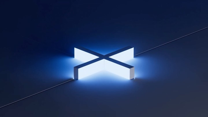 Abstract glowing 'X' shape on dark surface. Modern geometric design with blue light emanating. Minimalist composition, studio shot.