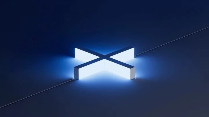 Glowing white cross-shaped sculptural element embedded in a dark blue surface with subtle panel lines.