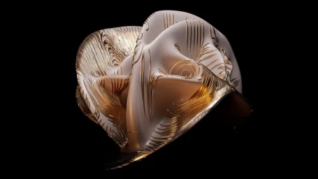Abstract sculptural CGI artwork with folded metallic surfaces and intricate golden linear grooves against a solid black background.