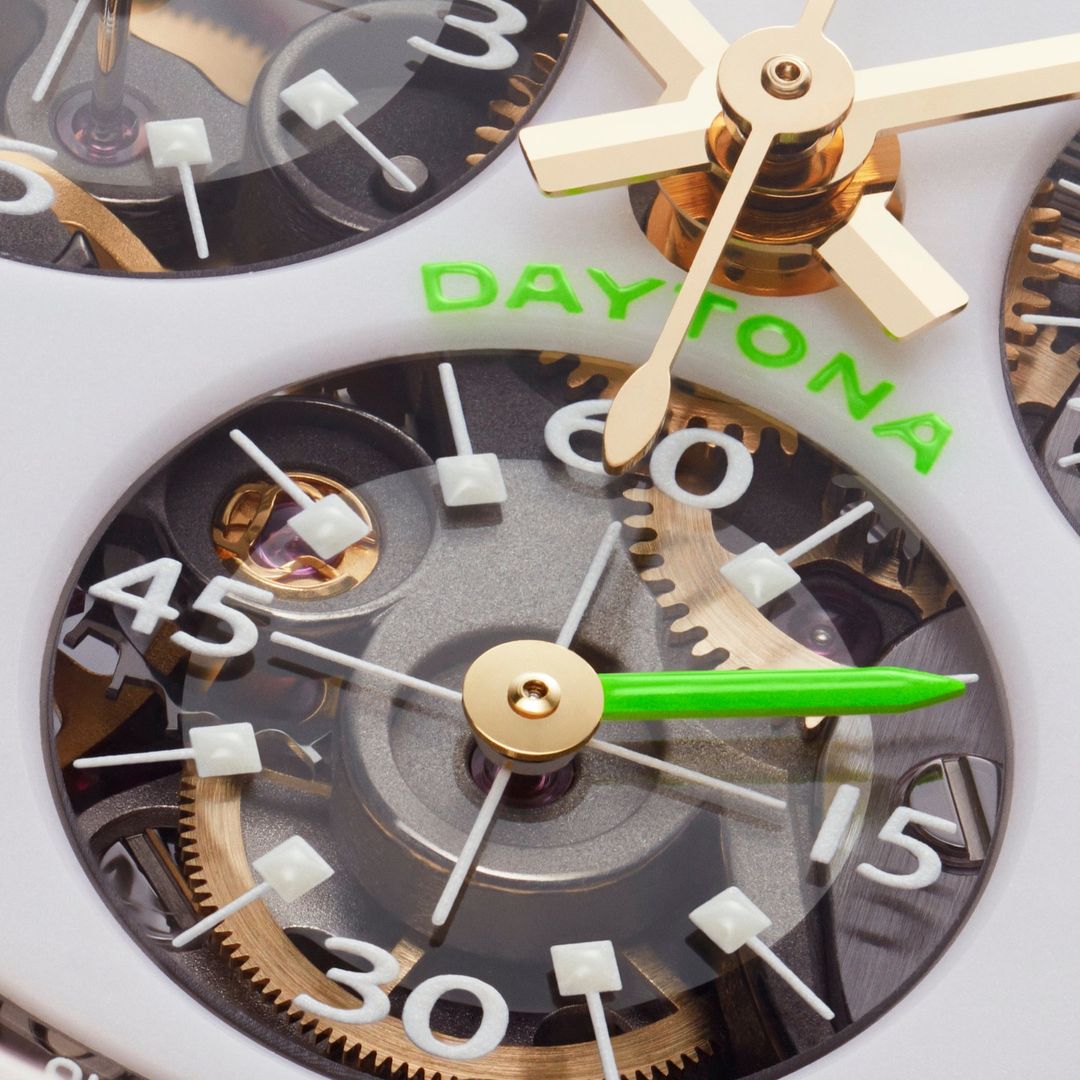 Detailed macro view of a wristwatch face showcasing intricate gears, gold hands, white markers, and vibrant green accents, reflecting precision.