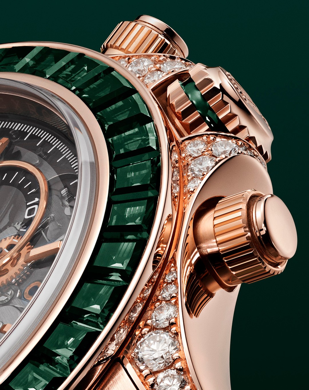 Close-up of a luxury watch featuring emerald gemstones and diamond embellishments, set against a deep green background, high-end luxury. 