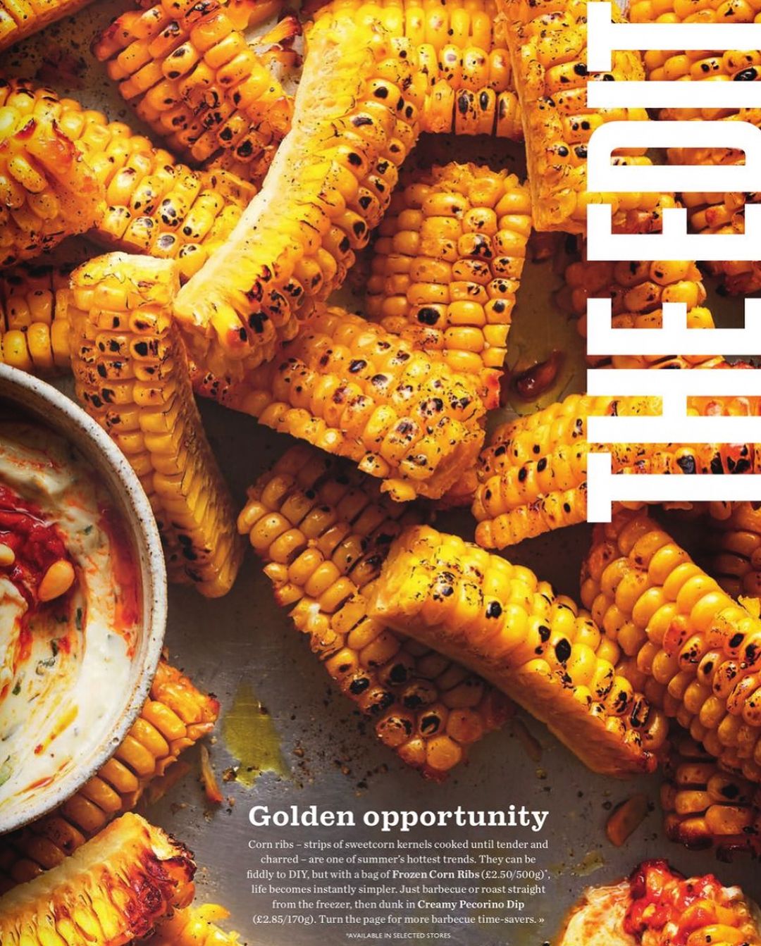 Overhead shot of grilled corn ribs with a creamy dip, showcasing golden-brown kernels and charred edges, perfect for food photography.