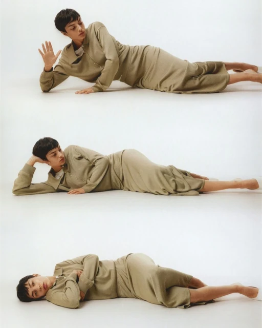 Person in olive green dress poses in three different positions, laying on their side against a white background in a photo studio.