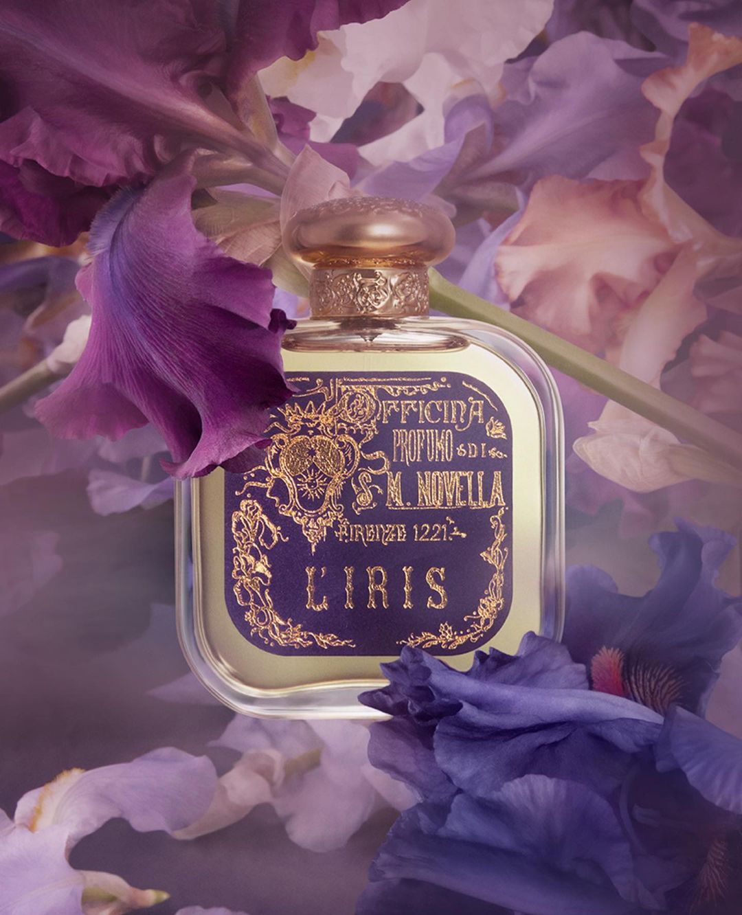 Luxury perfume bottle by Santa Maria Novella, L'Iris scent, surrounded by purple iris flowers, gold accents, and soft lighting.