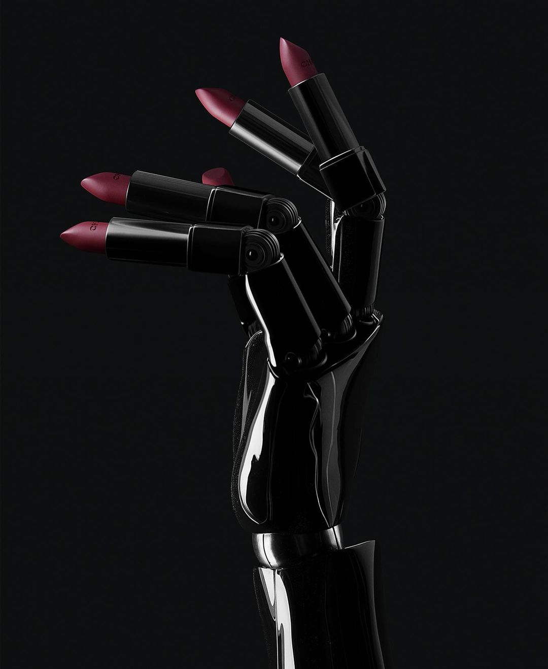 Black robotic hand holding three red lipsticks in a dark studio environment, showcasing beauty and technology integration with dramatic lighting.