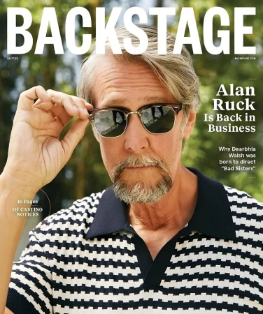 Portrait of Alan Ruck wearing sunglasses and a patterned polo shirt, photographed by G.L Askew II.