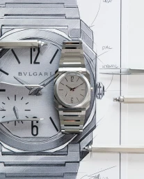 Bvlgari luxury watch placed on top of detailed pencil sketch design blueprints in Paris by photographer Gabriel De La Chapelle